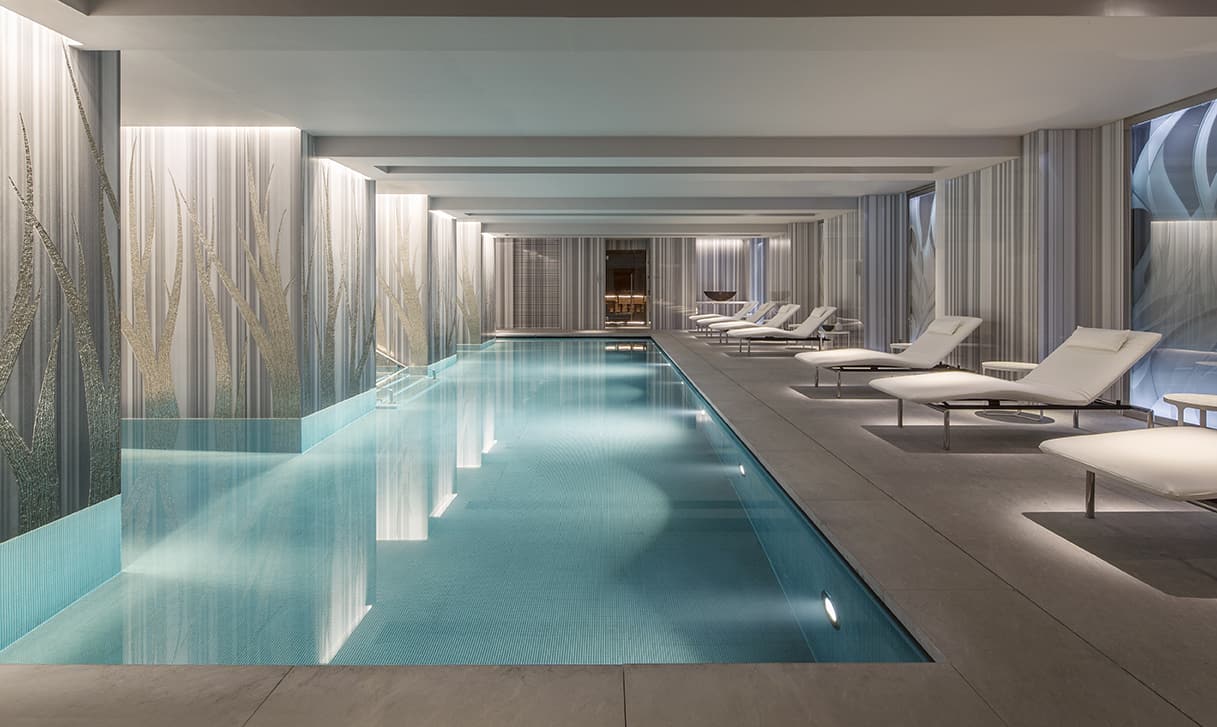 Seamless acoustic wall finish integrated into a calm interior.